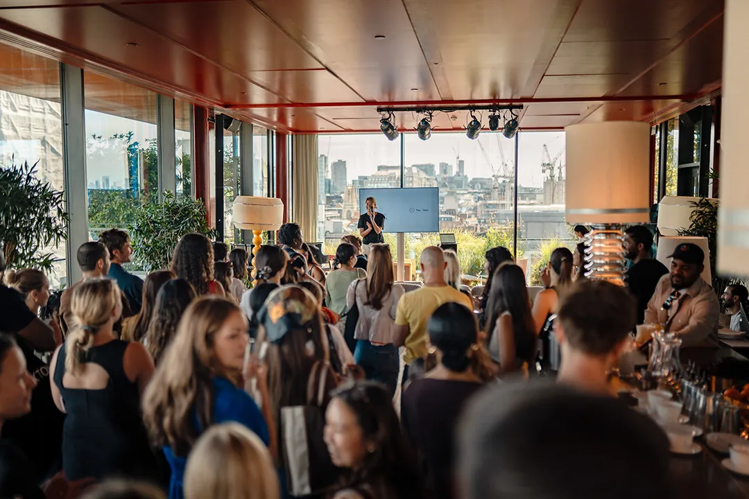 Guests at a corporate reception overlooking the city, event photography by Party Pixel