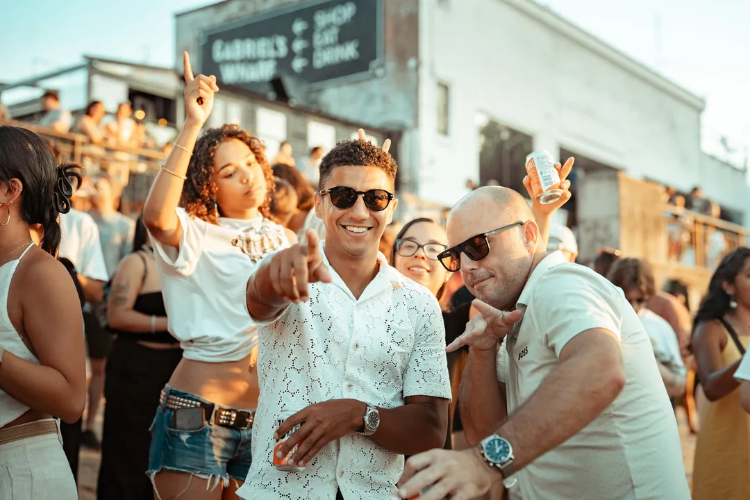 Open-air summer event in golden light, event photography by Party Pixel