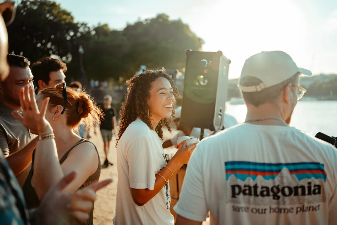 Golden hour crowd at an open-air event, event photography by Party Pixel
