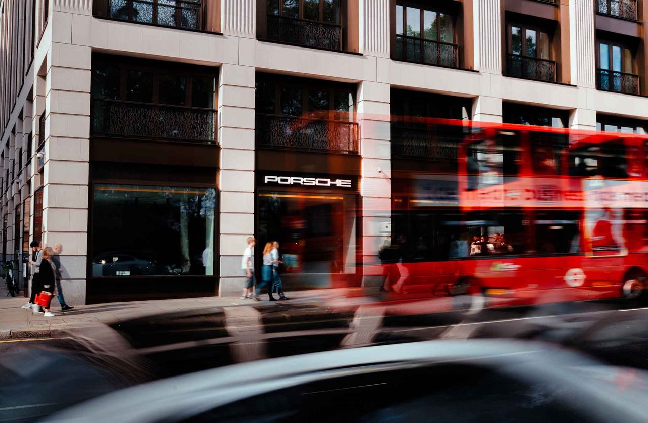 London street frontage photographed with the traffic in motion